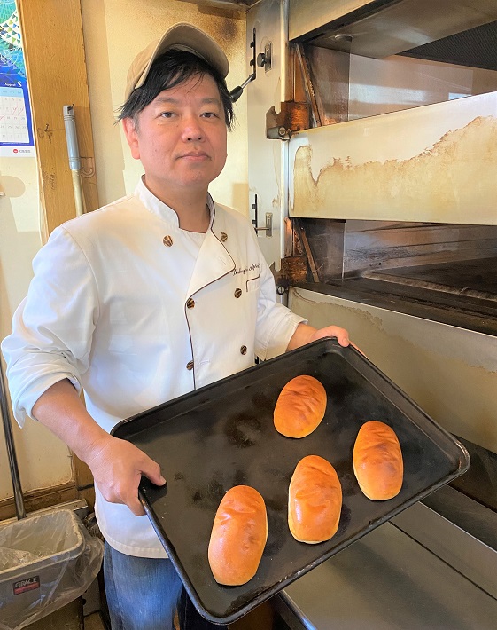三石 佳男さん