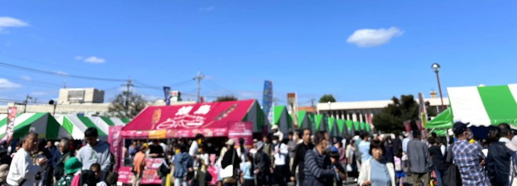 実現しよう! 東京に直結する鉄道を!駐車場では産業祭が行われていました